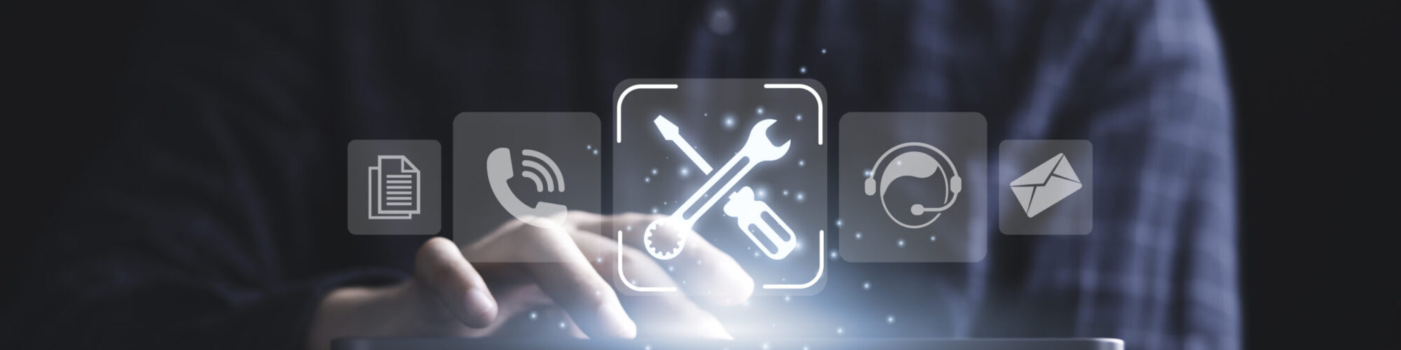 Businessman holding tablet with icon include wrench torque telephone operator and e-mail for customer service contact center and maintenance repair concept.